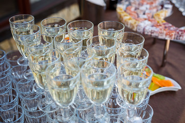 Glass glasses with drinks stand on a table