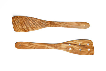 A spatula and a cooking spoon made of olive tree-wood