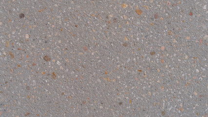 Old cement beige cement wall with pores and bumps. Abstract neutral background for design and title.