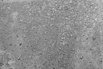 Obraz premium Old cement porous wall made of gray cement. Abstract colorless background for design and title