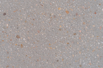 Beige cement wall with bumps and splashes. Abstract texture background