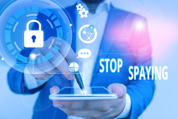 Handwriting text Stop Spaying. Conceptual photo quit in secretly obtain information on an enemy or...