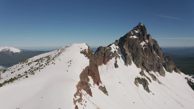 Cascade Mountains, Oregon circa-2019.  Aerial view of Mount Thielsen.  Shot from helicopter with Cineflex gimbal and RED 8K camera.