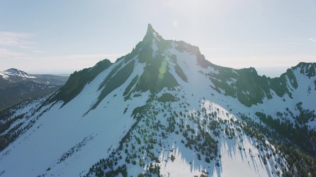 Cascade Mountains, Oregon circa-2019.  Aerial view of Mount Thielsen.  Shot from helicopter with Cineflex gimbal and RED 8K camera.