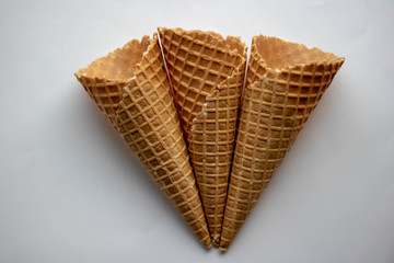 and ice cream cones on white background.