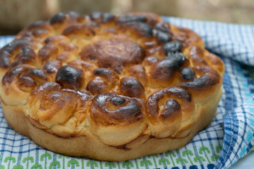 burnt cake on a blue tablecloth at the fair