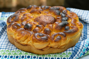 burnt cake on a blue tablecloth at the fair