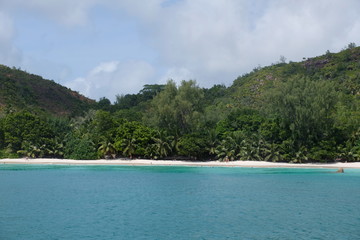 Fototapeta na wymiar Seychelles' paradise baches as seen from the boat