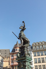 Fototapeta na wymiar fountain with lady justice in Frankfurt