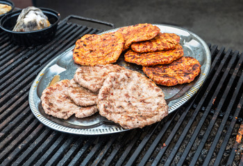 Appetizing pieces of grilled meat cooked on the grill