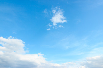 Naklejka na ściany i meble Blue open sky with white clouds landscape
