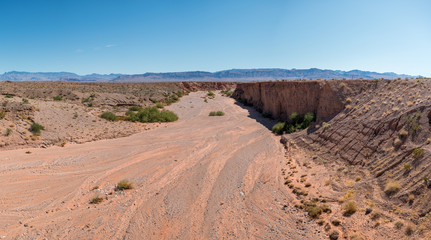 Dry River Path With Large Mountains in the Background