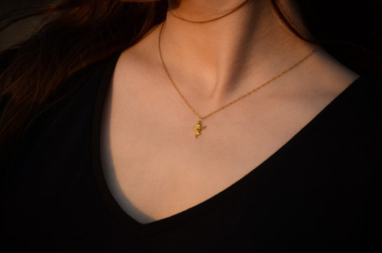 necklace on woman's neck