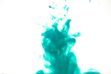 colorful blue ink isolated on white background, cloud of paint swirling in water, liquid dynamic abstract background