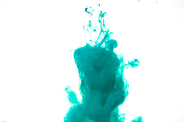colorful blue ink isolated on white background, cloud of paint swirling in water, liquid dynamic...