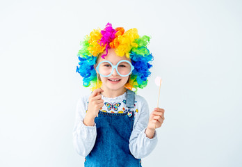 Little girl wearing colorful wig