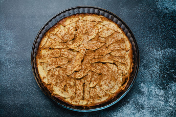 Sweet homemade apple cake with cinnamon. Top view