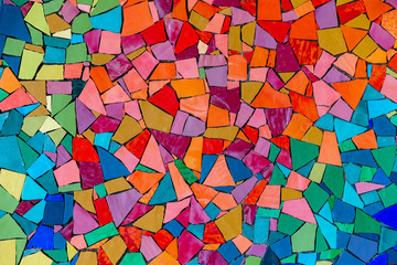 Multicolored abstract wall, texture from ceramic triangle colorful pieces