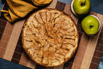 Sweet homemade apple cake with cinnamon. Top view
