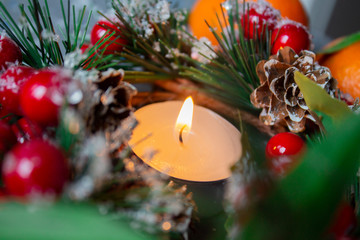 Fire candles on christmas background. Christmas candles and fir tree. Christmas.