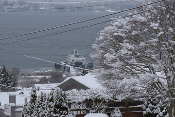Fototapeta premium ferry docking after snow storm