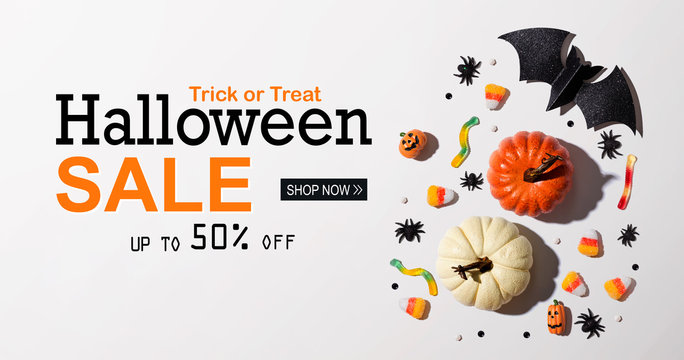 Halloween sale banner with Halloween decorations - flat lay