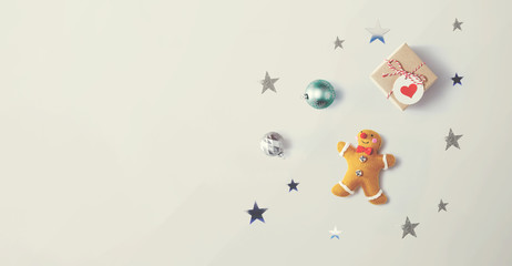 Christmas gingerbread with ornaments - overhead view flat lay