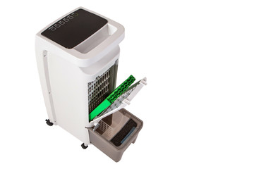 Fototapeta premium Mobile air purifier with filters. Cleaning the air in the room. Dust removal. Mobile air conditioner with a set of filters. Replacement of filters. A place for labels.