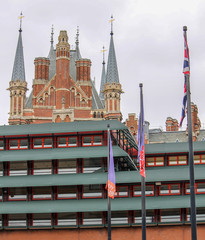 London's British Library facade with the St Pancras Renaissance Hotel towering out above it