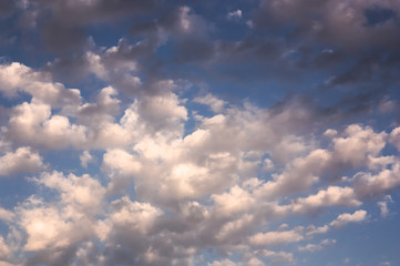 Fototapeta premium Clouds covering the summer blue sky