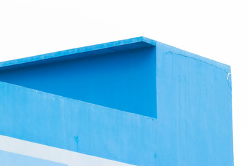 The walls of the building are painted blue and white.
