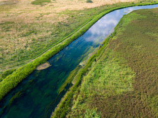 Fototapeta na wymiar Aerial view of the Gacka River in Lika region, Croatia