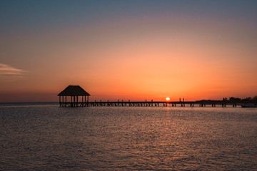 Fototapeta na wymiar Amazing sunset at Holbox Island in the Caribbean Ocean of Mexico