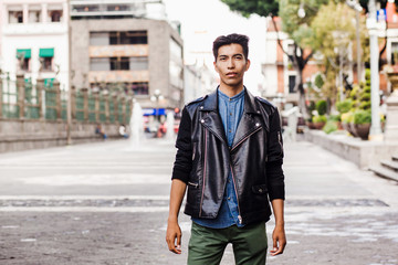 Obraz premium Mexican hispanic guy, portrait of young student man in Mexico city