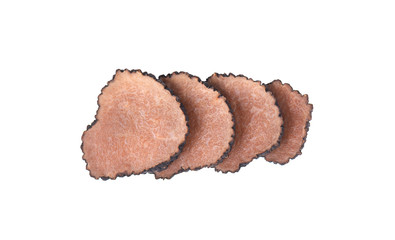 Black truffles isolated on a white background. Fresh sliced truffle. Delicacy exclusive truffle mushroom. Piquant and fragrant French delicacy. Clipping path.