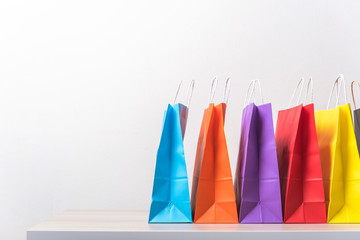row of colourful shopping bag