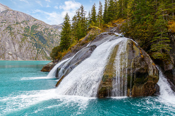 Tracy arm fjord waterfall in Alaska wilderness
