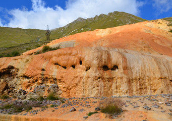 Mineral red water from the mineral springs in Gudauri in the Kazbegi District. Sources of mineral water with fossils Mtskheta Mtianeti Region, Georgia.