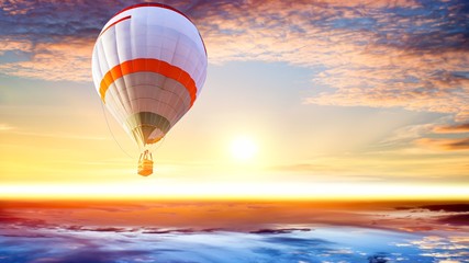 Hot air balloons flies in blue sky