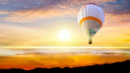 Hot air balloons flies in blue sky