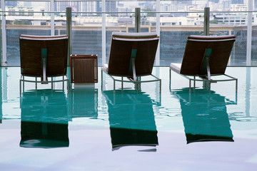 Beautiful tropical beach front hotel resort with swimming pool,