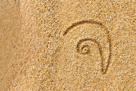 Closeup image of thai letter jaaw jaan meaning plate written at yellow beach sand background.