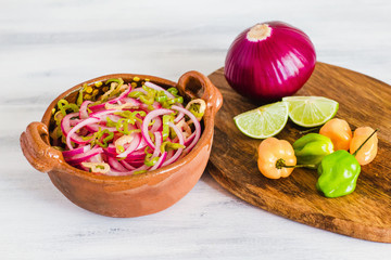 habanero sauce with onion and lemon, traditional for Cochinita Pibil from Merida Yucatan Mexico
