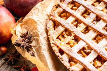 Freshly baked autumn apple pie with cinnamon. Selecive focus. Shallow depth of field.