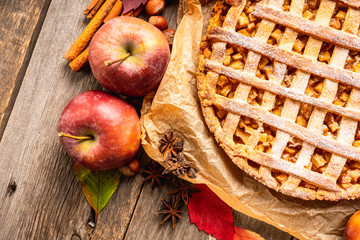Freshly baked autumn apple pie with cinnamon. Selecive focus. Shallow depth of field.