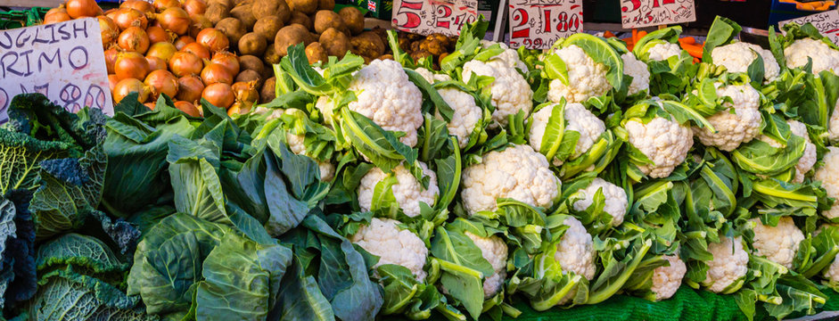 A display of vegetables on a market stall
