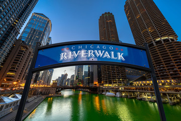 The landmark Chicago riverwalk label over the cityscape river side at the twilight time, united states of America, USA downtown skyline, Architecture and building with tourist concept
