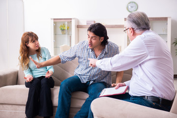 Young pair visiting experienced doctor psychologist