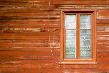 brown window on vintage wooden wall