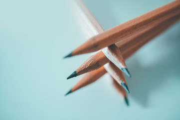 stacked pencils for teamwork concept background.